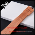 Men Skinny Ties into Handmade Paulownia Wood Necktie